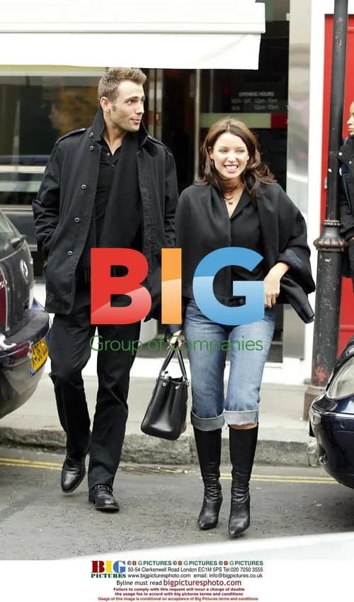 Dannii Minogue and Friend Enjoy Rainy Day in London
