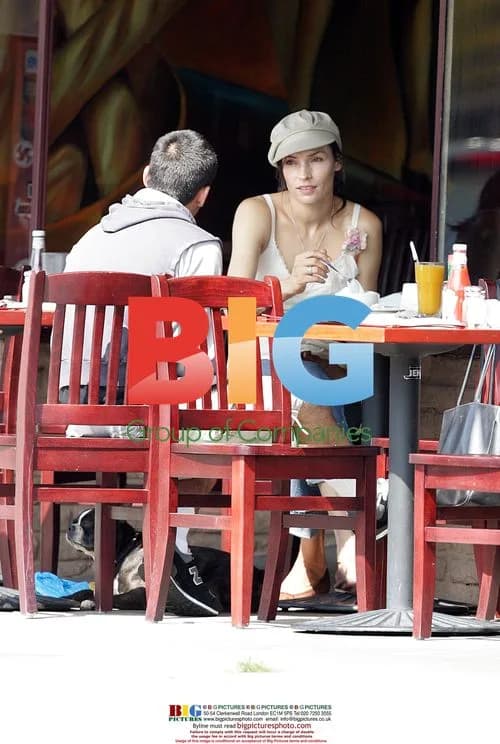Famke Janssen Enjoys Lunch with Dog