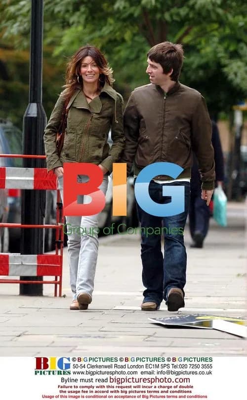 Noel Gallagher walks with girlfriend in London