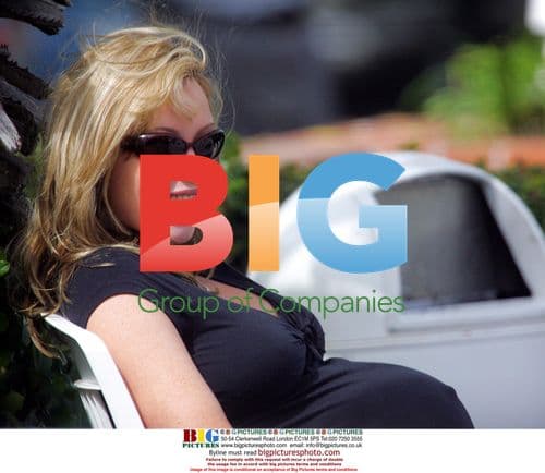 Pregnant Actress Kimberly Davis Outside Fred Segals