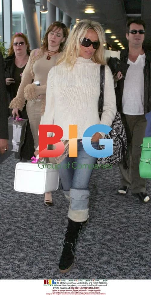 Pamela Anderson at Heathrow Airport