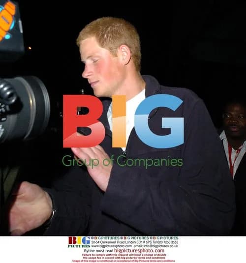 Prince Harry Leaves Club with Bodyguards