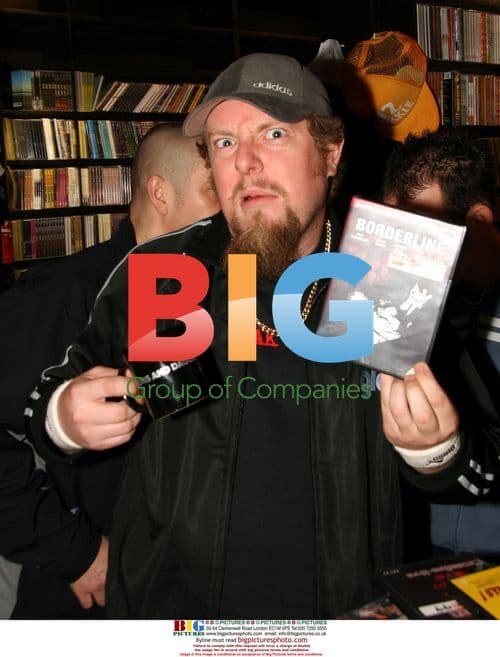 Welsh Rappers Goldie Lookin Chain Signing Copies