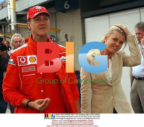 Michael Schumacher and wife Corina arrive at Interlagos