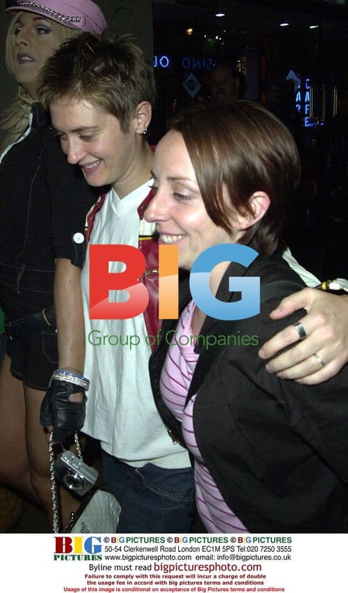 Kitten Pinder Kisses Partner in London