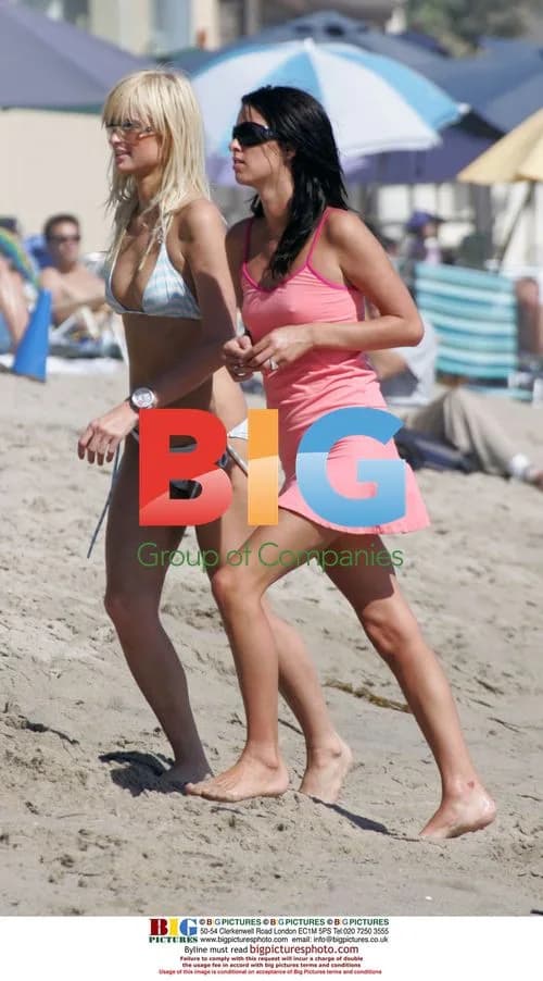 Paris & Nicky Hilton frolic on Malibu beach