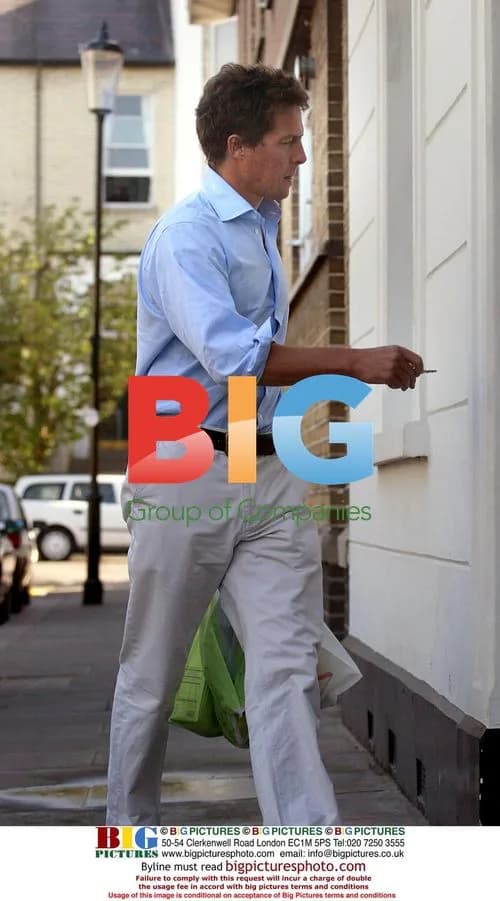 Hugh Grant Returning Home from Shopping
