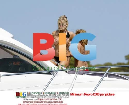 Abi Titmus Tans on Yacht in France