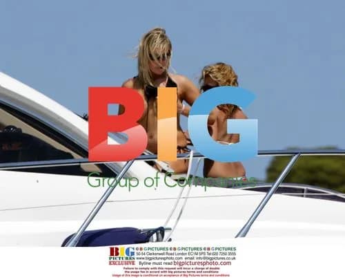 Abi Titmus Tans on Yacht in France