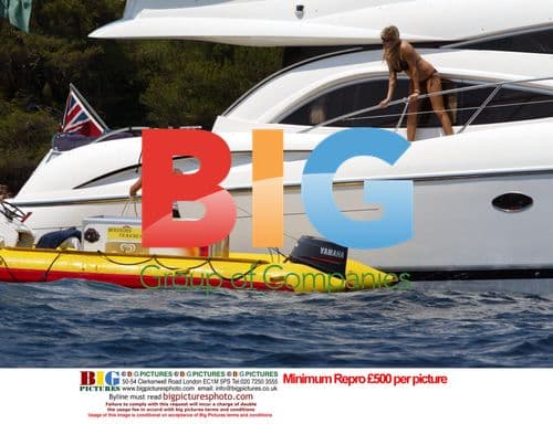 Abi Titmus sunbathing on yacht in France