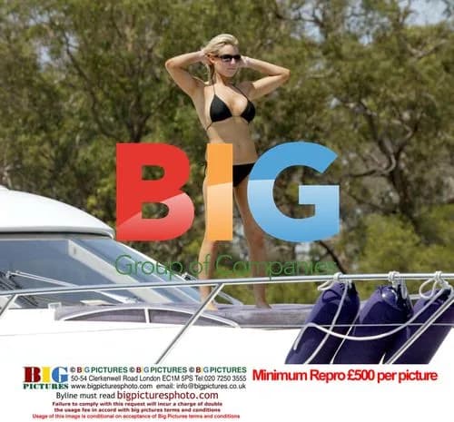 Abi Titmus Sunbathes on Yacht in France