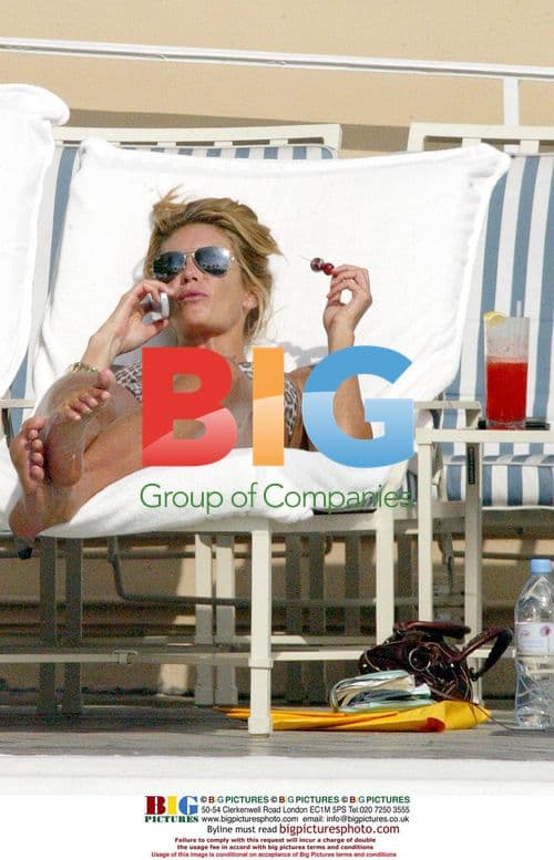 Elle Macpherson Relaxes Poolside in Beverly Hills