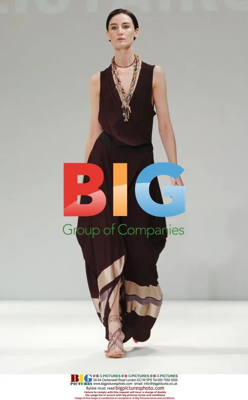 Erin O'Connor walks Alistar Carr runway