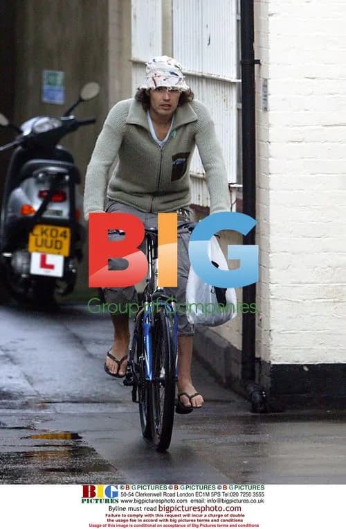Russell Brand Riding Bike in London
