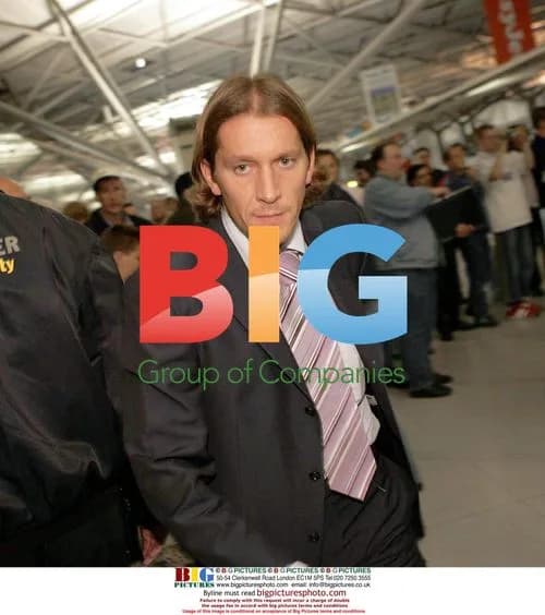 Michel Salgado arriving at airport after defeat