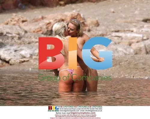 Glamour models Tara and Delta on holiday in Spain