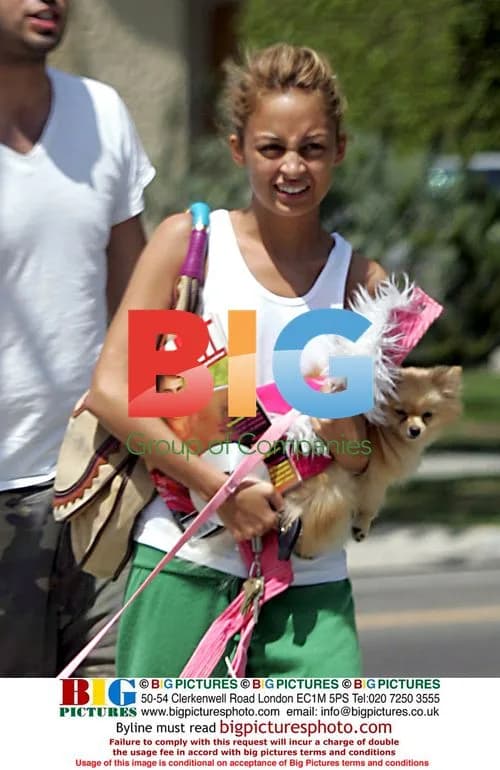 Nicole Richie's Hands Full