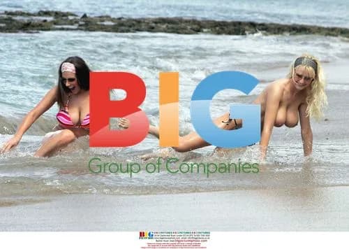 Glamour models Michelle Marsh and Lucy Pinder in St. Lucia
