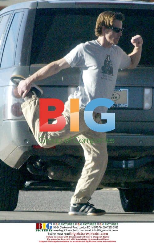 Danny Moder Stretching During Car Journey