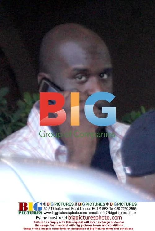 Shaquille O'Neal on Phone Outside Hotel