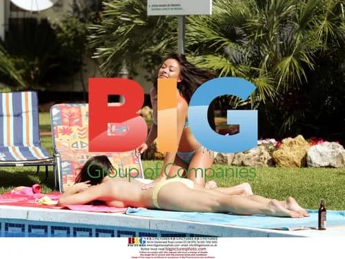 Lisa Scott Lee Relaxing by Pool