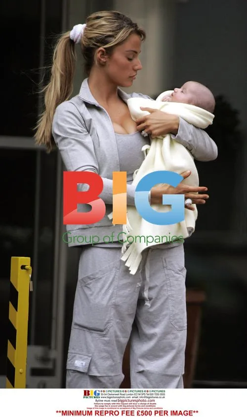 Katie Price and Peter Andre Leave Hotel with Baby