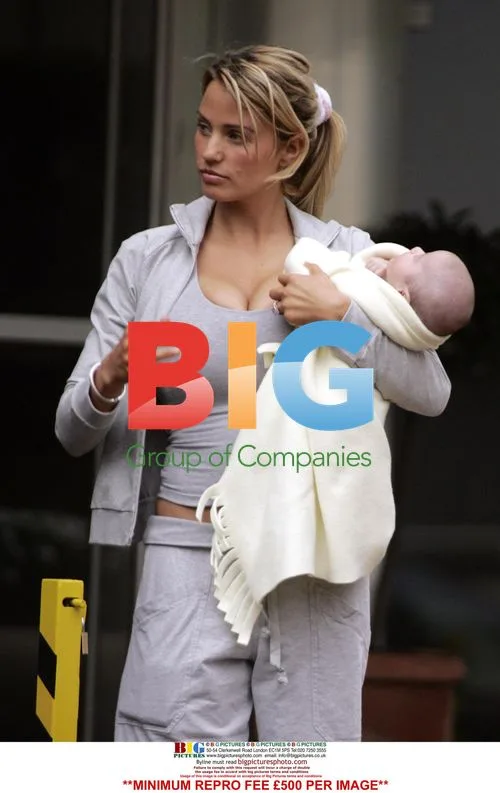 Katie Price and Peter Andre Leave Hotel with Baby
