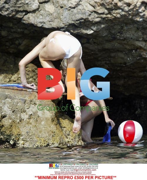 Abi Titmuss Enjoying a Swim in Spain