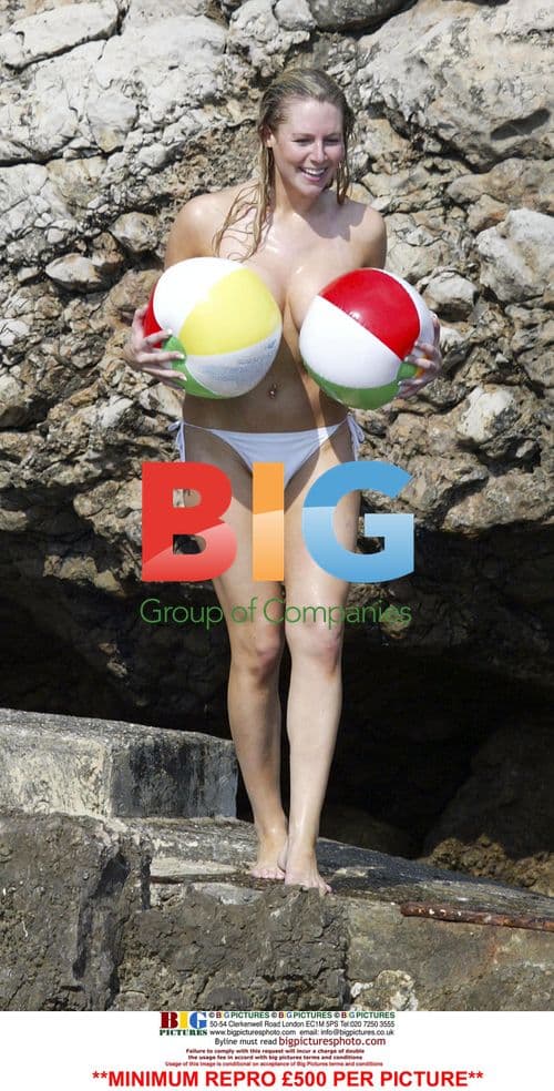 Abi Titmuss Enjoys Pool Fun in Spain