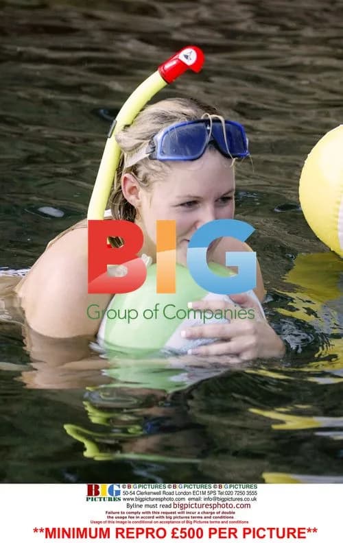 Abi Titmuss Enjoys Swim in Spain