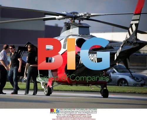 Tom Cruise and Katie Holmes arrive by helicopter for Mission Impossible filming