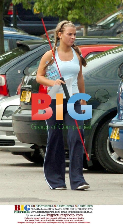 Coleen McLoughlin Carrying Object at Golf Club