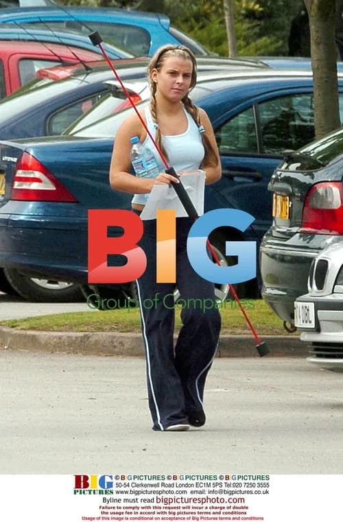 Coleen McLoughlin Carrying Strange Object