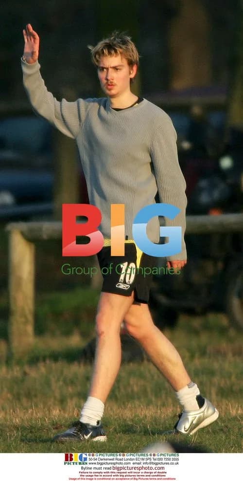 Euan Blair plays football with girlfriend