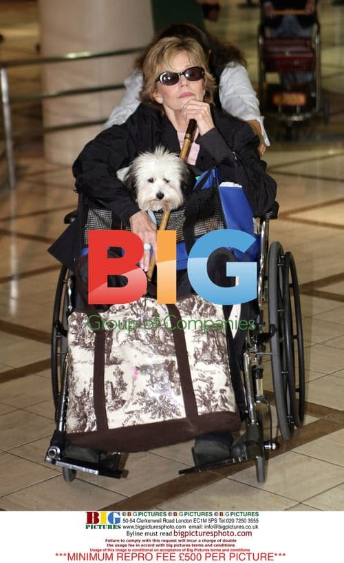 Jane Fonda Wheeled into LAX