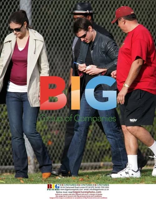 Tom Cruise and Katie Holmes watch daughter's football match