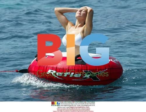 Abi Titmuss Enjoys Water Sports in Spain