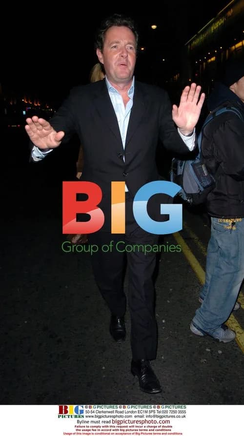 Piers Morgan leaving OK Magazine Christmas Party