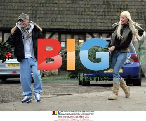 Emma B and Brian Harvey look at Christmas trees