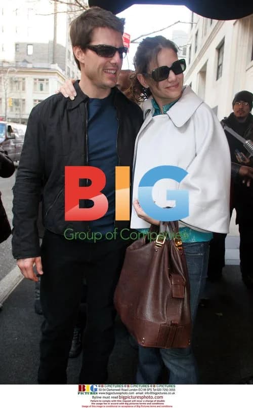 Tom Cruise and Katie Holmes Leave Hotel