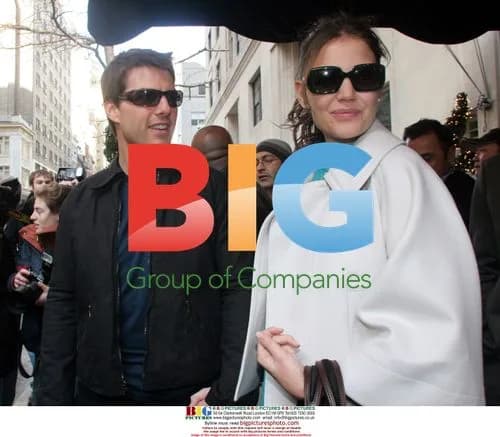 Tom Cruise and Katie Holmes leave hotel