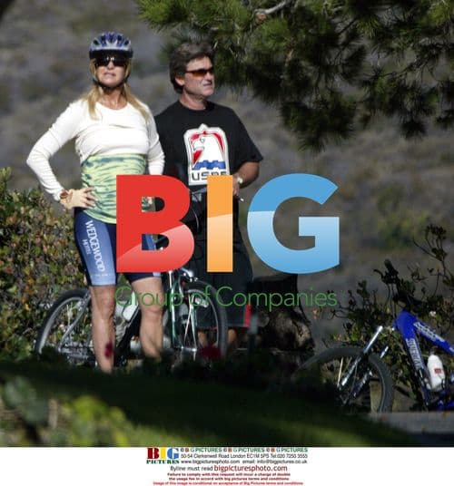 Kurt Russell and Goldie Hawn bike ride in Malibu