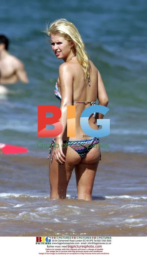 Hilton Sisters Strut Stuff in Maui Surf