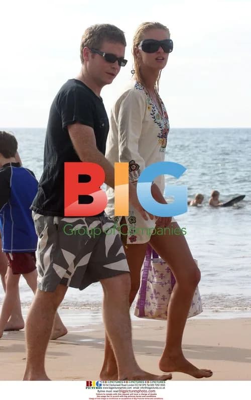 Paris Hilton Loses Sunglasses and Top in Hawaii