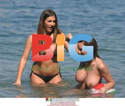 Glamour models Lucy Pinder and Sophie Howard relaxing in the Caribbean