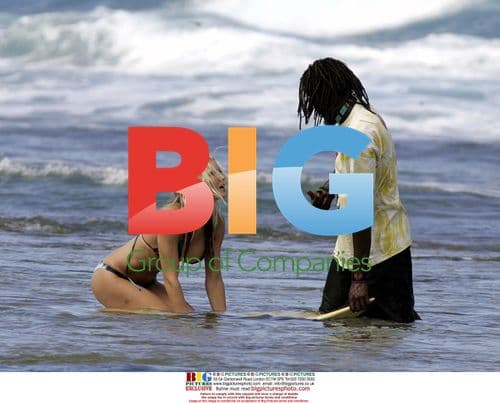 Model Caprice relaxes on Caribbean holiday