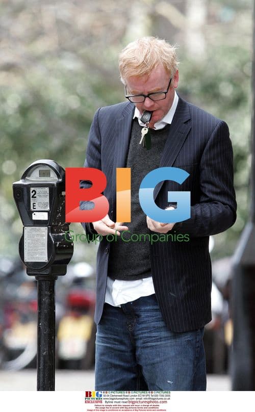 Chris Evans Spotted Fueling Up and Driving Companion