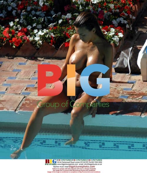 Model Lucy Becker Tanning in Spain