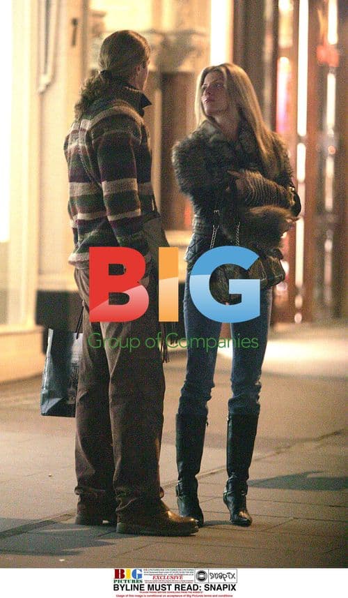 Footballer Emmanuel Petit and girlfriend on London shopping trip