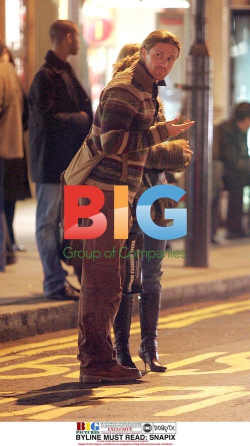 Emmanuel Petit and his girlfriend shopping in London